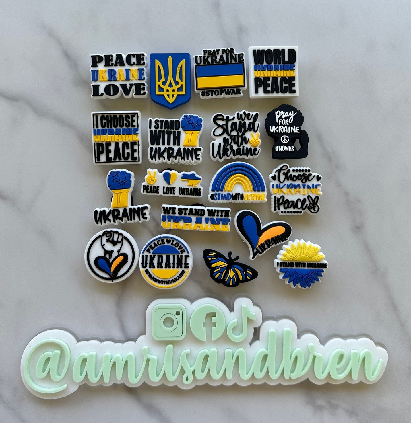 New popular world peace for Ukraine charms for your crocs, trending support for Ukraine croc compatible shoe charms, blue and yellow Ukraine