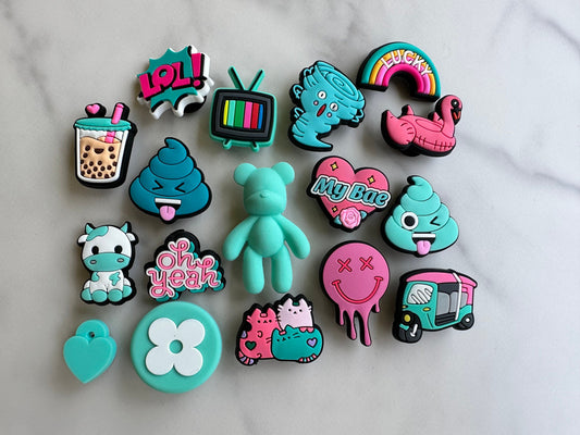 new trending pink and teal charms for your crocs, croc compatible teal and pink shoe charms, trending shoe charms, cute cow charm, boba tea