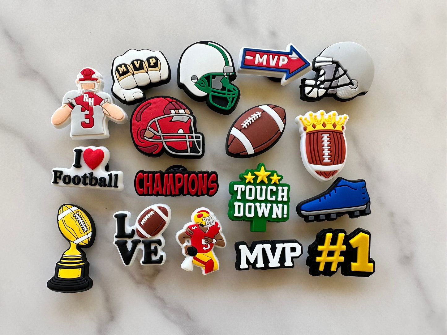 football themed shoe charms for your crocs, croc compatible charms, mvp shoe pins, helmet button for crocs, cleat charm